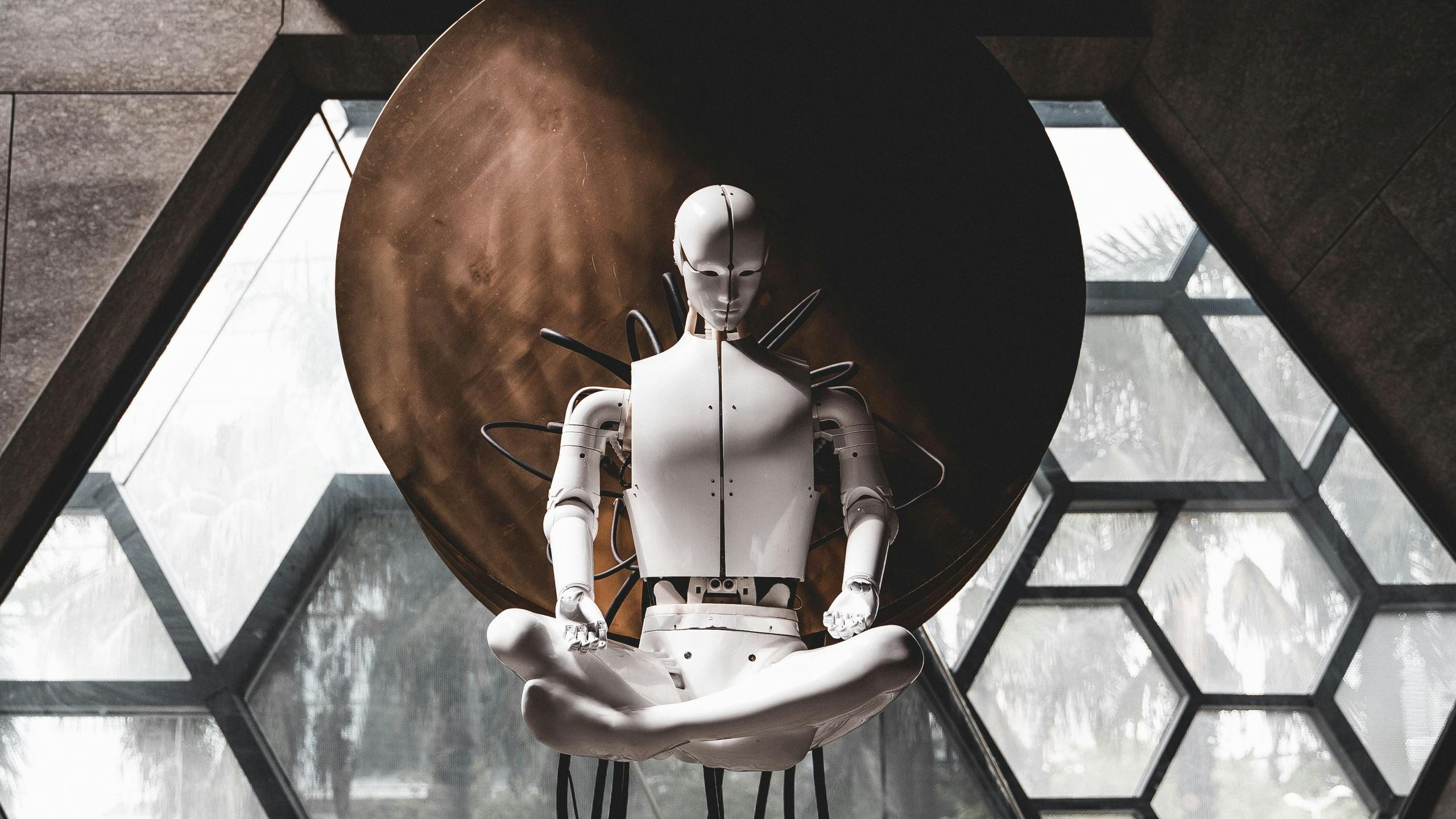 Robot seated in meditation